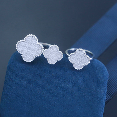 Αγορά Χονδρικό 925 Sterling Silver Fine Jewelry Τρέντυ Custom Ρυθμίσιμο Δαχτυλίδι Τέσσερα Φύλλα Δαχτυλίδι Ζίρκον Δαχτυλίδια Για Κορίτσια online manufacture